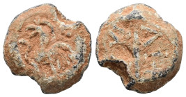 PB Byzantine seal (AD 6th–7th centuries)
Obv.: An mythical animal, seemingly a griffin or dragon.
Rev.: A box monogram.
Weight: 4.69 g.
Diameter: 15.6...