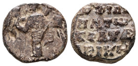 PB Byzantine seal (AD 11th–12th centuries).
Obv.: The archangel Michael, standing and holding the scepter and globus cruciger. On either side, illegib...