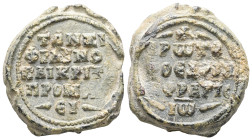 PB Byzantine lead seal of John Xiphilinos, protoproedros and judge (AD 11th century, second half)
Obv: Inscription of four lines, a cross above and a...