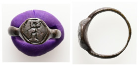 AE Greco-Roman finger ring (AD 1st – 3rd centuries)
Bronze finger ring; hexagonal bezel with engraved design: nude male figure (warrior)advancing, lef...