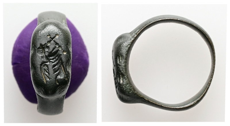 Early Byzantine finger-ring: angel carrying a cross (c. AD 6th century)
Bronze f...