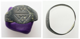 AE Medieval finger-ring (AD 9th-14th centuries)
Bronze finger-ring; bezel engraved with linear design.
Weight: 1.50 g.
Diameter: 17.67 mm.