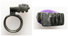 Byzantine key-ring (AD 6th – 8th centuries)
A bronze finger ring; composed of a hoop, short stem, and tooth-like rectangular bit.
Weight: 22.50 g.
Dia...