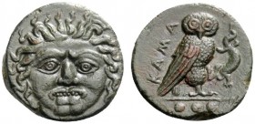 GREEK COINS 
 Sicily, Camarina 
 Tetras circa 420-410, Æ 3.93 g. Gorgoneion, hair bound with fillet. Rev. KAM Owl standing r. on one leg, clutching ...