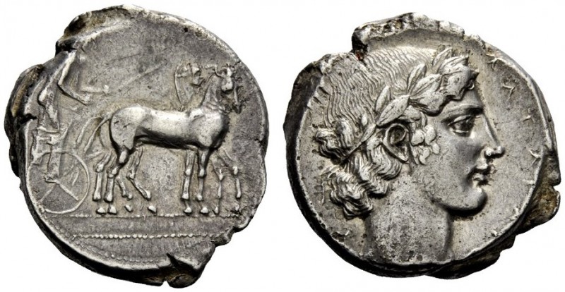 GREEK COINS
Catana
Tetradrachm circa 440-430, AR 17.31 g. Slow quadriga driven...