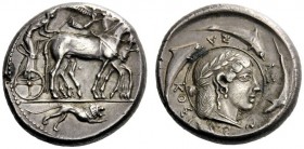 GREEK COINS 
 Syracuse 
 Tetradrachm of the Demareteion series circa 470-460, AR 17.51 g. Slow quadriga driven r. by charioteer, wearing chiton and ...