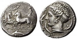GREEK COINS 
 Syracuse 
 Tetradrachm signed by Eukleidas circa 405-400, AR 17.26 g. Fast quadriga driven l. by chiton- clad charioteer, holding kent...