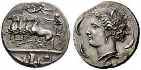 GREEK COINS 
 Syracuse 
 Decadrachm signed by Euainetos circa 400, AR 42.44 g. Fast quadriga driven l. by charioteer, holding reins and kentron; in ...