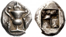 GREEK COINS 
 Cyclades, Naxos 
 Stater circa 520-515-490, AR 11.74 g. Cantharus with ivy leaf finial on lid; grape bunches hanging from handles. Rev...
