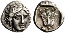 GREEK COINS 
 Islands of Caria, Rhodes 
 Tetradrachm circa 404-385, AR 15.24 g. Head of Helios facing three-quarters r. Rev. ΡOΔION Rose with bud to...
