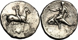 Greek Italy. Southern Apulia, Tarentum. AR Nomos, 332-302 BC. D/ Horseman right, crowning himself; below, Ionic capital. R/ Phalantos riding on dolphi...