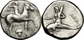 Greek Italy. Southern Apulia, Tarentum. AR Nomos, 280-272 BC. D/ Horseman right, crowning himself; below, Ionic capital. R/ Phalantos riding on dolphi...