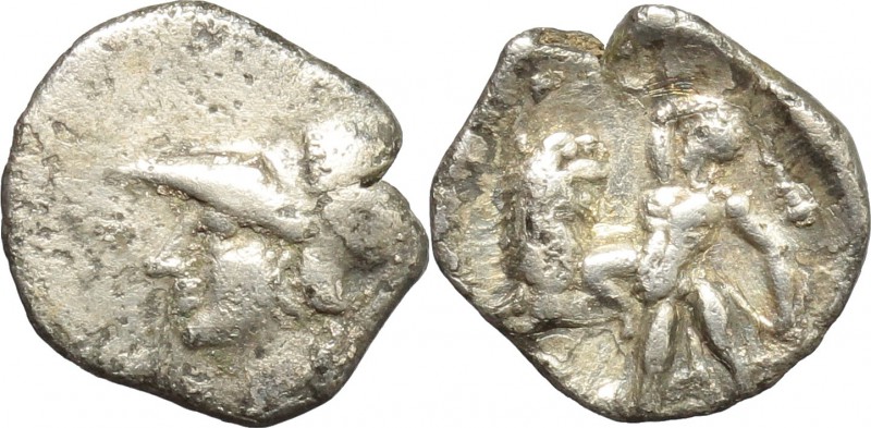 Greek Italy. Southern Apulia, Tarentum. AR Diobol, 300-230 BC. D/ Helmeted head ...