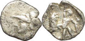 Greek Italy. Southern Apulia, Tarentum. AR Diobol, 300-230 BC. D/ Helmeted head of Athena left. R/ Herakles, holding club overhead, kneeling left on t...