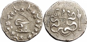 Greek Asia. Ionia, Ephesus. AR Cistophor, 133-67 BC. D/ Cista mystica with snake, within wreath. R/ Two coiled serpents; between, bow-case; above, cor...