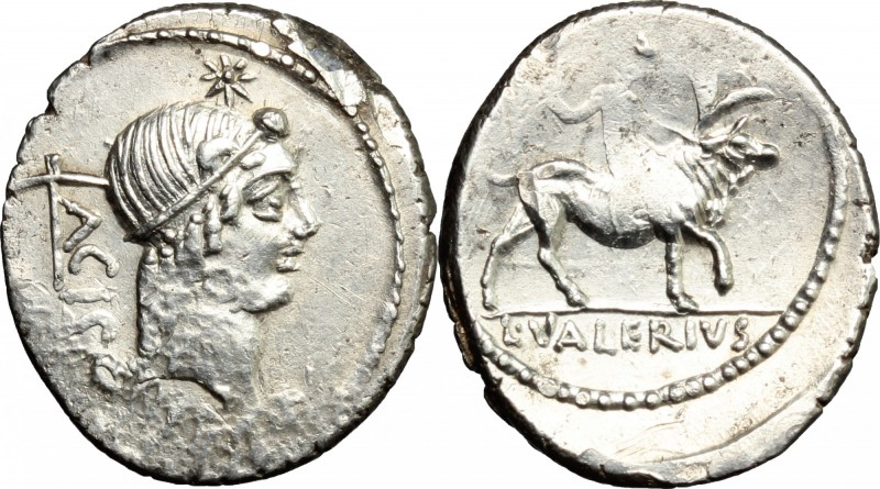 L. Valerius Acisculus. AR Denarius, 45 BC. D/ Head of Apollo right, hair tied wi...