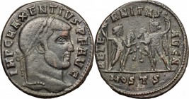 Maxentius (306-312). AE Follis, Ostia mint, 309-312. D/ Head of Maxentius right, laureate. R/ Castor and Pollux standing facing each other, holding wi...
