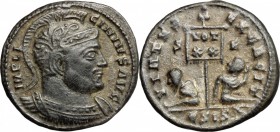 Licinius I (308-324). AE 19mm, Siscia mint, 320 AD. D/ Bust of Licinius right, helmeted, cuirassed. R/ Standard inscribed VOT/XX between two seated ca...