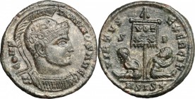 Constantine I (307-337). AE 19mm, Siscia mint, 320 AD. D/ Bust of Constantine right, helmeted, cuirassed. R/ Standard inscribed VOT/XX between two sea...