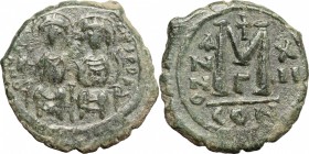 Justin II (565-578). AE Follis, Constantinople mint, 576-577. D/ Justin and his wife enthroned facing. R/ Large M. MIB 43a. AE. g. 13.60 mm. 31.00 Gre...