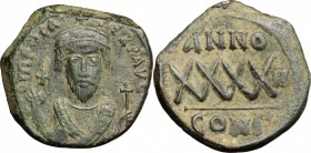Phocas (602-610). AE Follis, Constantinople mint, 603 AD. D/ Consular bust of Phocas facing, holding mappa and cross. R/ Large XXXX. MIB 61b. Sear 640...