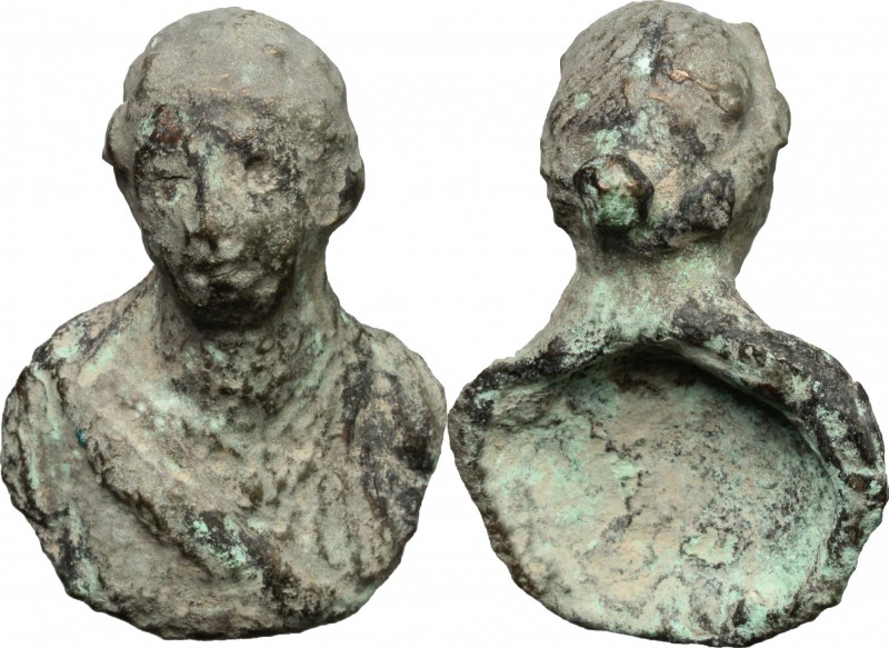 Bronze applique in the shape of female bust. Roman period, 1st-3rd century AD. 4...