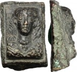 Bronze applique with female bust. Roman period, 1st-3rd century AD. 27 x 18 mm.