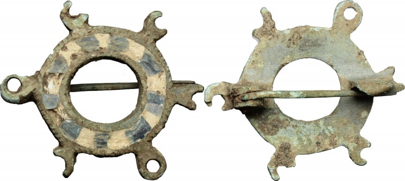 Bronze fibula with glass paste inlaid. Migration period, 9th-10th century AD. Si...