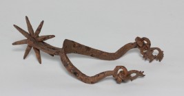 Medieval iron spur with large rowel. 160 x 100 mm.
