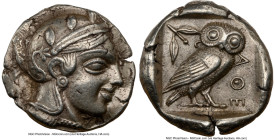 ATTICA. Athens. Ca. 455-440 BC. AR tetradrachm (24mm, 17.18 gm, 4h). NGC XF 5/5 - 4/5. Early transitional issue. Head of Athena right, wearing crested...