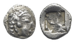 IONIA. Colophon. Circa 530-500 BC. Hemiobol (Silver, 6.74 mm, 0.33 g) Archaic head of Apollo right wearing earring. Rev. Irregular incuse square. Kim ...