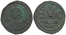 Justinian I, 527-565. Follis (Bronze, 41.16 mm, 23.63 g). Nikomedia, 1st officina, dated RY 15 (541/2). D N IVSTINI-ANVS P P AVC Helmeted and cuirasse...