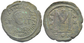 Justinian I, 527-565. Follis (Bronze, 37.78 mm, 20.62 g). Constantinopolis, dated RY 22 (548/9). D N IVSTINI-ANVS P P AVC Helmeted and cuirassed bust ...