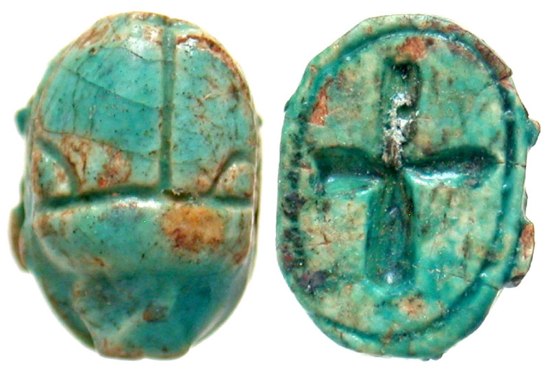 "An Egyptian New Kingdom Period, 1550-1050 BCE, faience scarab with cross. Scara...