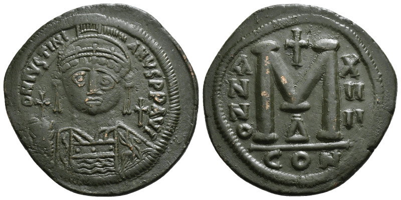 JUSTINIAN I (527-565). Follis. 
Obv: D N IVSTINIANVS P P AVG.
Helmeted and cuira...