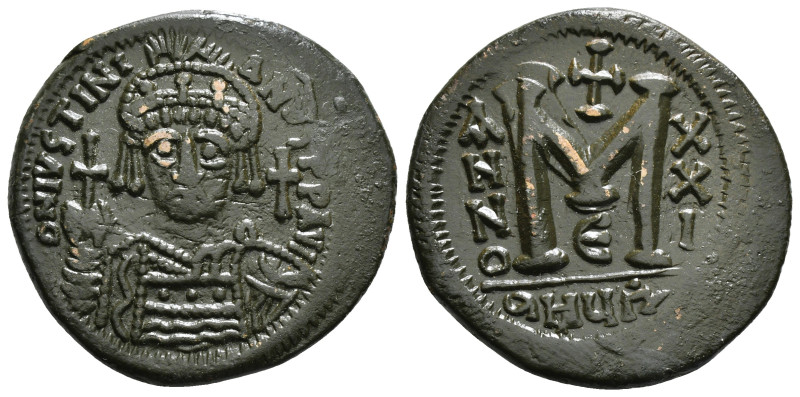 JUSTINIAN I (527-565). Follis. 
Obv: D N IVSTINIANVS P P AVG.
Helmeted and cuira...