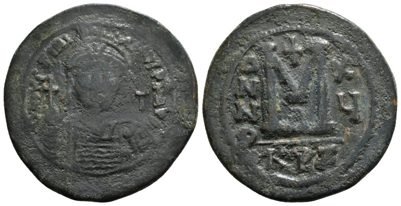 JUSTINIAN I (527-565). Follis.
Obv: D N IVSTINIANVS P P AVG.
Helmeted and cuiras...