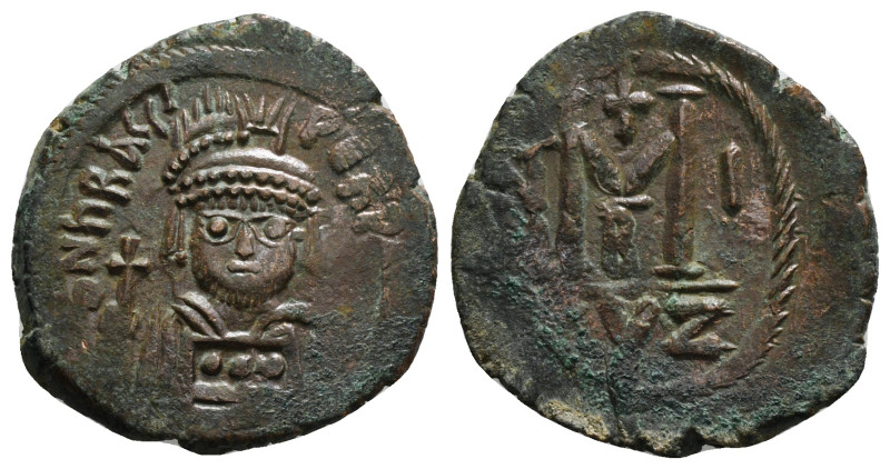 HERACLIUS (610-641). Follis. Cyzicus.
Obv: D N ҺRACLI PЄRP AVG.
Helmeted and cui...