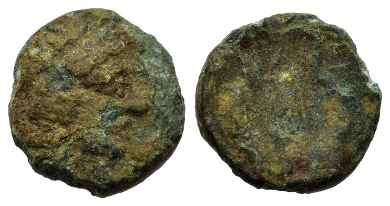 Uncertain Greek. Æ (11mm, 1.2g). Laureate head r. R/ Uncertain.