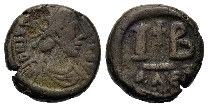 Justinian I (527-565). Alexandria, 12 Nummi (Æ 5 g, 15 mm). D N IVSTINIANVS P P ...