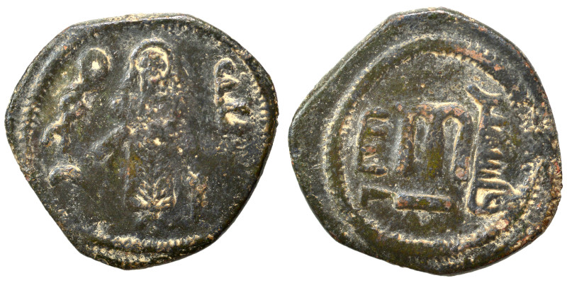 Umayyad Caliphate. al-Malik ibn Marwan, AH 74-80 / 693/4-699/700 AD. Fals (bronz...