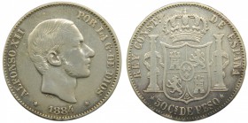 Alfonso XII (1874-1885). 1884. 50 centavos de peso. Manila. (Cal. 84). Limpiada.    Grado: MBC-