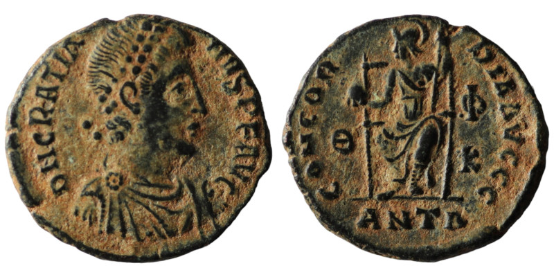 Gratian. (367-383 AD). Æ Follis. Antioch. Obv: D N GRATIANVS P F AVG. pearl-diad...