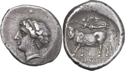 Greek Italy. Central and Southern Campania, Neapolis. AR Didrachm, 320-300 BC. Obv. Head of nymph left; symbol or letters behind. Rev. Man-headed bull...