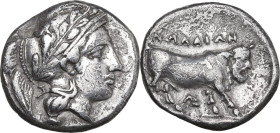 Greek Italy. Central and Southern Campania, Nola. AR Didrachm, 400-385 BC. Obv. Head of Athena right, wearing Attic helmet decorated with olive-wreath...