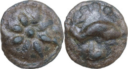 Greek Italy. Northern Apulia, Luceria. Light series. AE Cast Teruncius, c. 217-212 BC. Obv. Sunburst of eight rays. Rev. Dolphin right; above, three p...