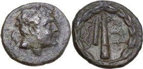 Greek Italy. Southern Apulia, Rubi. AE 18 mm, circa 300-225 BC. Obv. Head of young Herakles right. Rev. ΡΥΨ. Club, quiver and bow within laurel wreath...