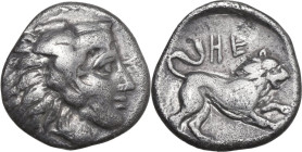 Greek Italy. Southern Lucania, Heraclea. AR Diobol, c. 432-420 BC. Obv. Beardless head of Herakles right, wearing lion skin. Rev. Lion crouching right...