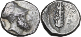 Greek Italy. Southern Lucania, Metapontum. AR Stater, c. 340-330 BC. Obv. Helmeted head of Leukippos right; small lion's head behind; [monogram below ...