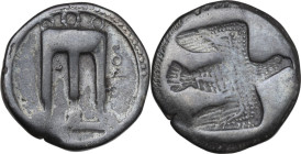 Greek Italy. Bruttium, Kroton. AR Nomos, c. 480-430 BC. Obv. ϘPO to right. Tripod with legs ending in lion's paws. Rev. Eagle flying right, incuse. HN...